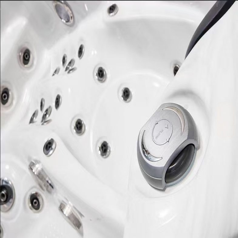 Massage jet and air-control detail on a HydroSerene shell