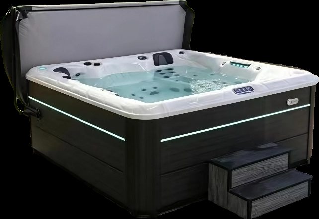 HydroSerene spa hot tub with entry steps, studio view