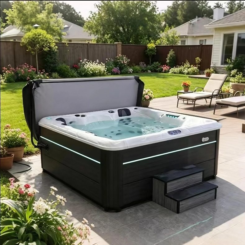 HydroSerene hot tub installed in a garden with planting