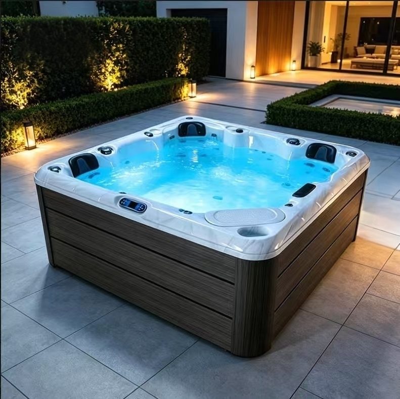 HydroSerene hot tub on a tiled patio at dusk